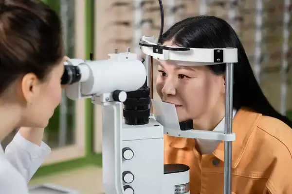 Younger lasik patient getting a checkup